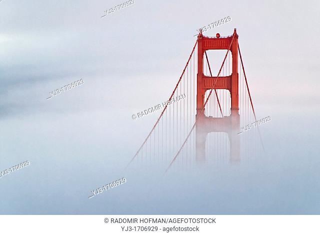 Golden Gate Bridge-south tower coverd in fog, California, USA