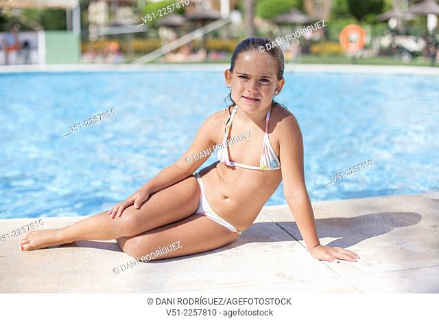 Pretty young girl in swimming pool