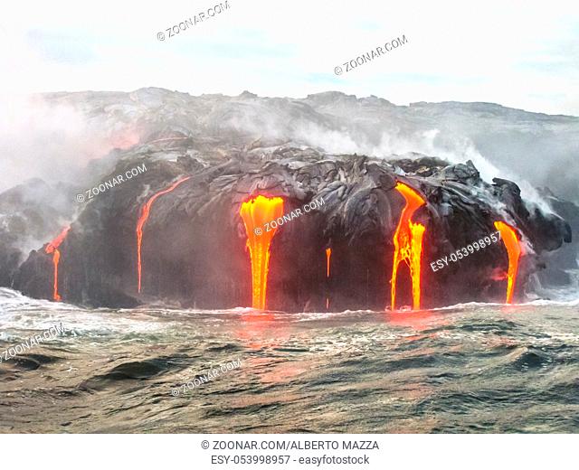 Close up of Kilauea Volcano, Hawaii Volcanoes National Park, also known Kilauea Smile because from 2016 seems to smile, erupting lava into Pacific Ocean