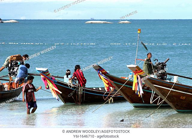 Traditional longtail boats at Sunrise Beach Ko Pha Ngan island Thailand
