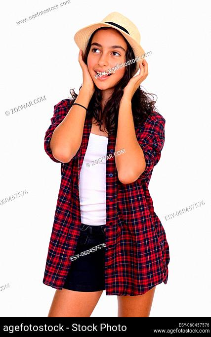 Studio shot of young beautiful tourist teenage girl isolated against white background
