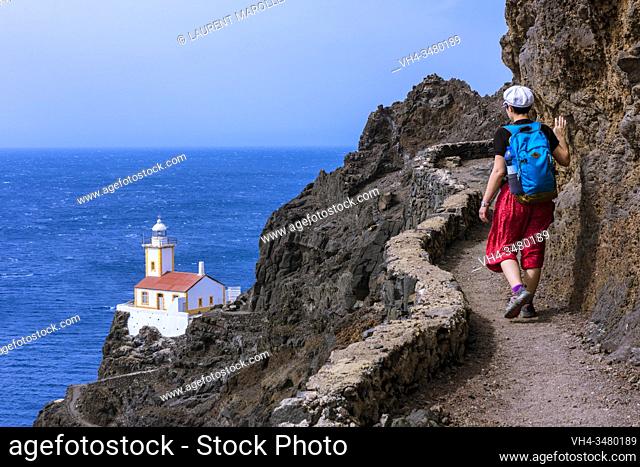 Woman Hiking to the Ponta Machado Lighthouse (Farol de Dona Amélia) of Sao Pedro Village, Sao Vicente, Cape Verde Islands, Africa