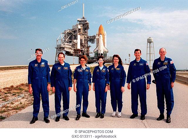 04/27/1999 --- The STS-96 crew visit Launch Pad 39B where Space Shuttle Discovery, in the background, is being prepared for the mission launch on May 20
