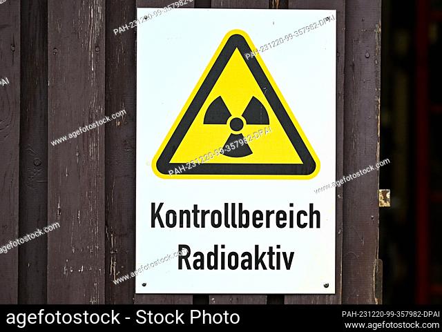 PRODUCTION - 12 December 2023, Saxony, Bad Schlema: ""Radioactive control area"" is written on a sign at the entrance to shaft 15 IIb of the Wismut mine