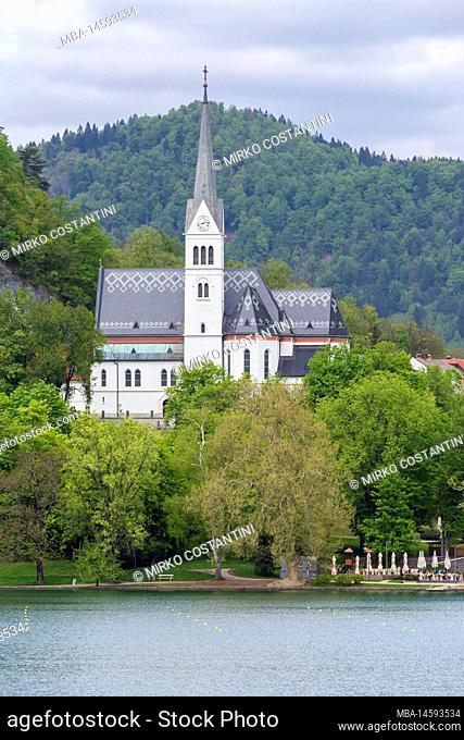 View of lake Bled at in spring and St. Martina Parish church. Bled, Upper Carniola, Slovenia