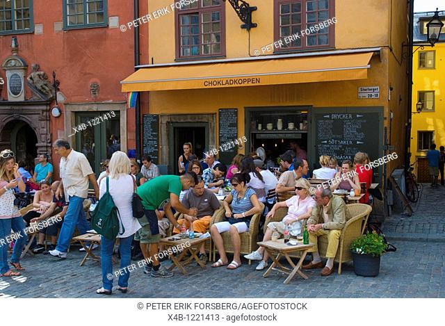 Busy cafe at Stortorget square Gamla Stan the old town Stockholm Sweden Europe