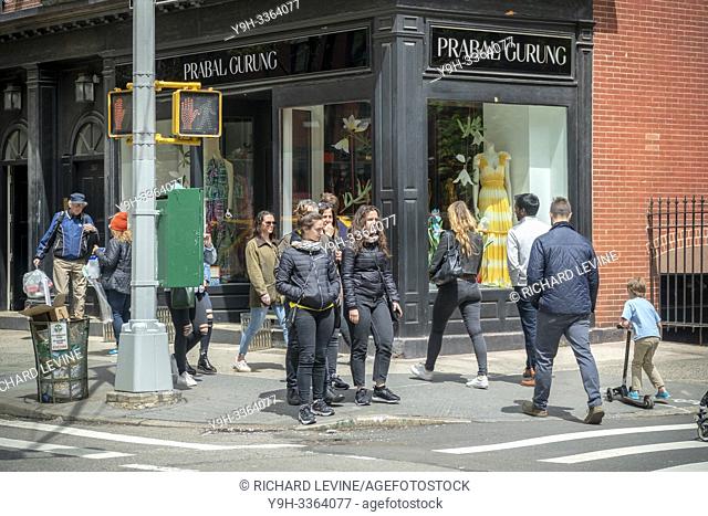 Shopping on trendy Bleecker Street in New York on Saturday, April 27, 2019. (© Richard B. Levine)