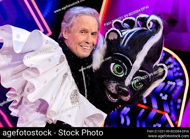 31 October 2021, North Rhine-Westphalia, Cologne: Peter Kraus (82), singer, is on stage as the unmasked character ""The Skunk"" following the Prosieben show...