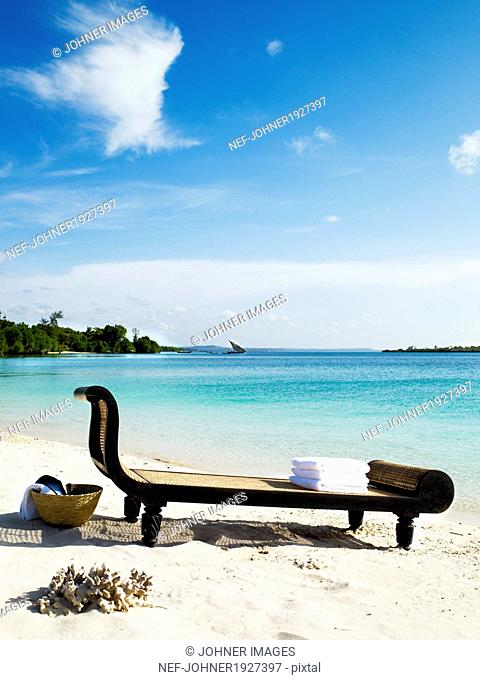 Sunchair on sandy beach, Zanzibar, Tanzania