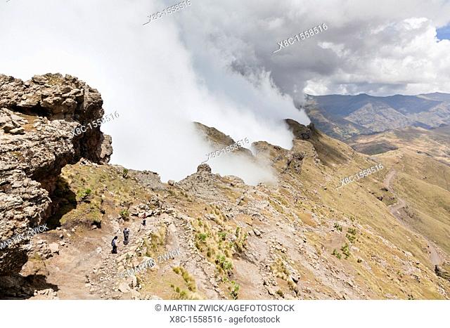 Trekking in the Simien Moutains NP, Ethiopia  Clouds are moving up at the edge of the escarpment forming a dramatic background  The Simien Semien, Saemen