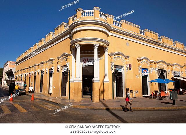 People in front of a colonial building in the historic center, Merida, Riviera Maya, Yucatan Province, Mexico, Central America
