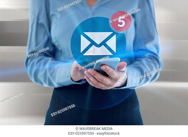 Composite image of businesswoman using smart phone