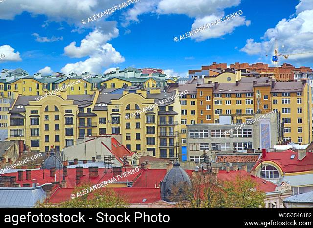 European town Ivano-Frankivsk Western Ukraine. Ivano-Frankivsk city views: central part of city. Cityscape with white clouds. Modern exterior