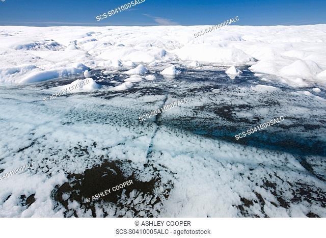Melt water on the Greenland ice sheet near camp Victor north of Ilulissat The Greenland ice sheet is the largest ice sheet outside of Antarctica Temperatues...