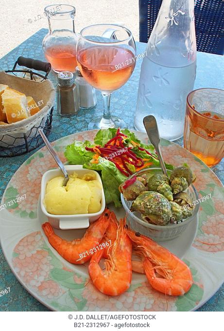 France, Poitou Charente, Charente Maritime. Food: "Crevettes" and "Bulots" with salad and "mayonnaise". At La Rochelle