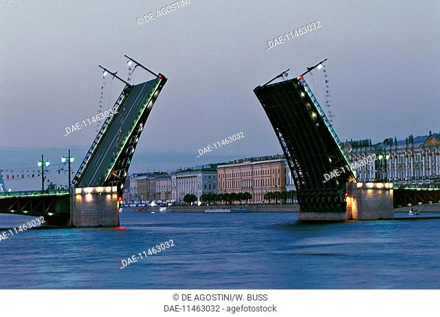 The opening of the Palace Bridge (1916) on the Neva river at the first evening light, St Petersburg (UNESCO World Heritage List, 1990), Russia