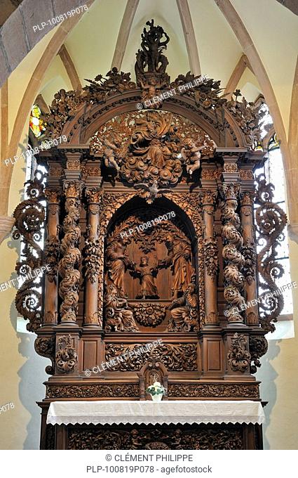 Altar with wooden retable in the Saint-Sébastien chapel at Dambach-la-Ville, Vosges, Alsace, France