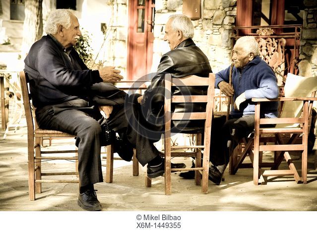Men in a terrace bar  Filoti Naxos island, Cyclades islands, Aegean Sea, Greece, Europe
