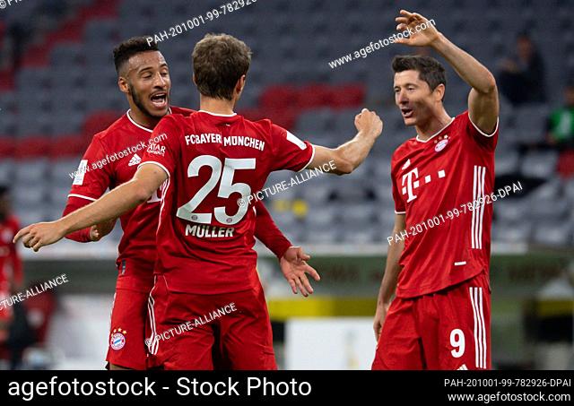 30 September 2020, Bavaria, Munich: Football: DFL Supercup, FC Bayern Munich - Borussia Dortmund in the Allianz Arena. Munich's Thomas Müller (M) cheers with...