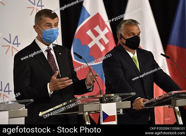 Prime ministers of Czech Republic Andrej Babis, left, and Hungary Viktor Orban attend a news conference after the V4 summit at the Lednice Chateau in Lednice