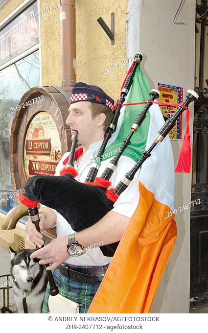 April 01, 2014. Busker playing the bagpipes. In Odessa, held Humorina (Day of humor, laughter and fun) this is an annual festival of humor held in Odessa