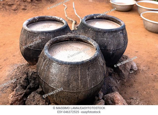 Casks of millet beer, Burkina Faso