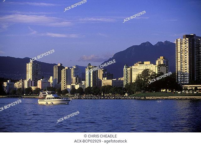 View across English Bay to West End condos with yachts, Vancouver, British Columbia, Canada