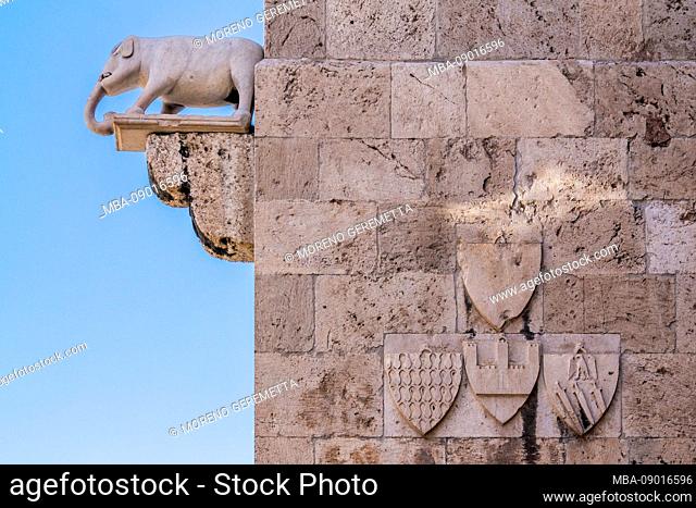Elephant tower, detail of the exterior of the Torre dell'Elefante in the Castello, showing the stone statue of an elephant, Cagliari, Sardinia, Italy