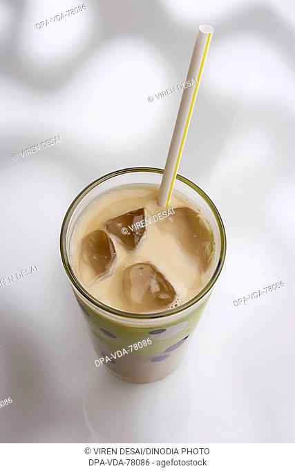 Drink Cold coffee with ice and straw against white pattern background