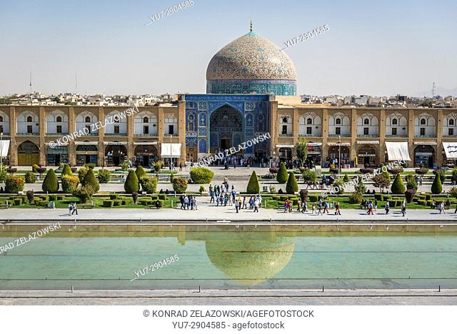 Pool at Naqsh-e Jahan Square (Imam Square, formlerly Shah Square) in centre of Isfahan in Iran. View with Sheikh Lotfollah Mosque