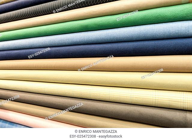 Pile of colorful cotton and wool textile on store