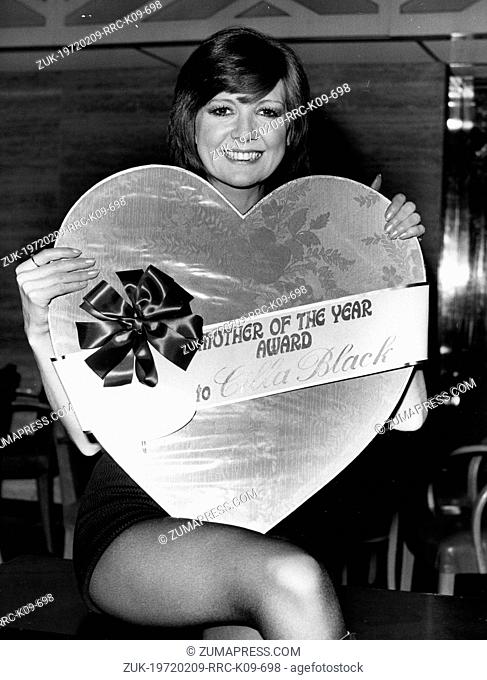 March 19, 1971 - Location Unknown - Pop singer CILLA BLACK, born May 27, 1943, hugs a giant box of chocolates, her prize as Mother of the Year