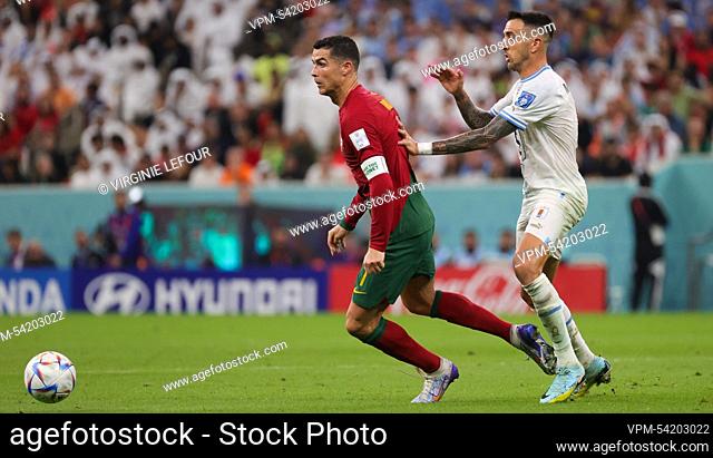 Portuguese Cristiano Ronaldo fights for the ball during a soccer game between Portugal and Uruguay, in Group H of the FIFA 2022 World Cup in Lusail Stadium