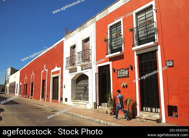 Man in front of the colonial buildings in the historic center, Valladolid, Yucatan Province, Mexico, Central America