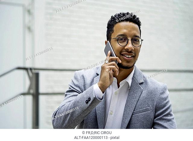 Businessman talking on smart phone