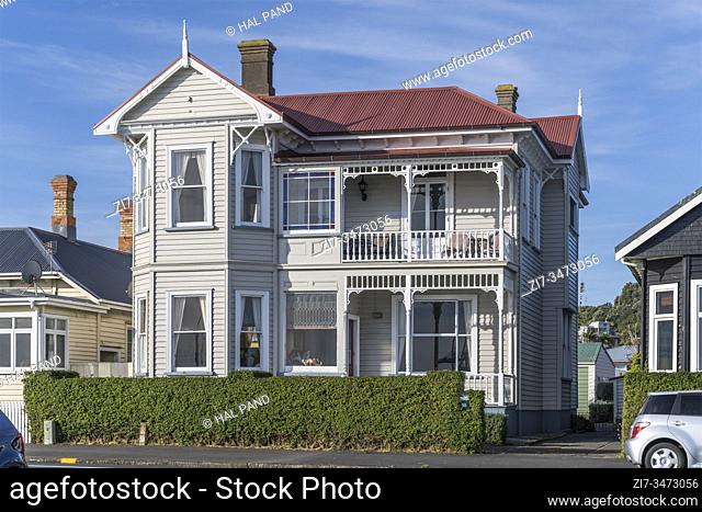 cityscape with traditional picturesque old house on waterfront at Devonport neighborhood, shot in bright late spring light at Auckland, North Island