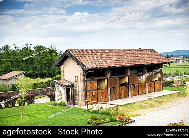 country farmhouse with horse boxes
