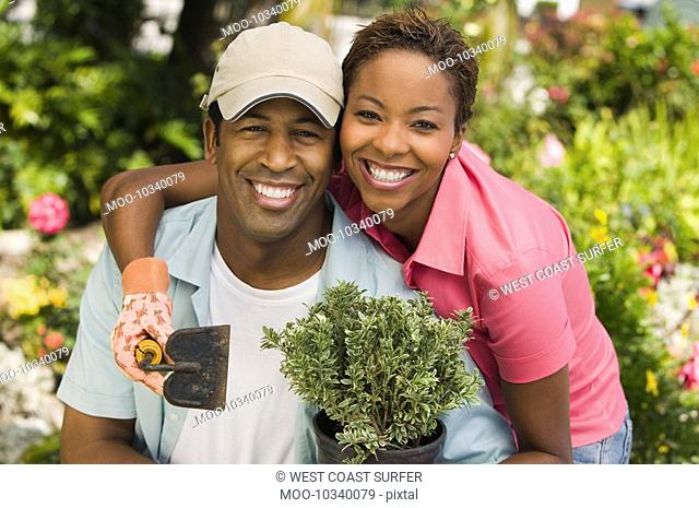 Couple gardening portrait