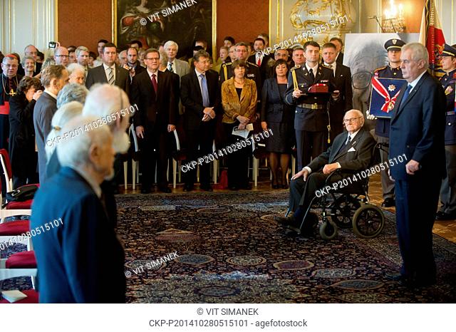 Czech President Milos Zeman (right) bestowed the Order of the White Lion, the highest state decoration, on Sir Nicholas Winton (in wheelchair)