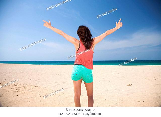 green bottom woman at the beach