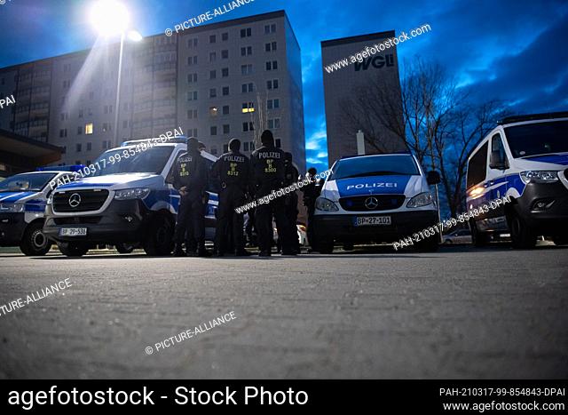 17 March 2021, Berlin: Federal police forces stand in a parking lot in Berlin-Lichtenberg and prepare for a raid. In the raid against smugglers accused of human...
