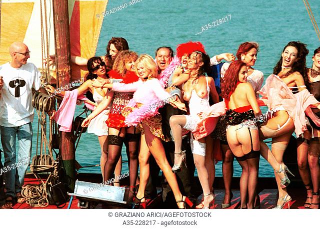 Tinto Brass and the female cast of the film 'Trasgredire', Mostra del Cinema, Venice, 1999