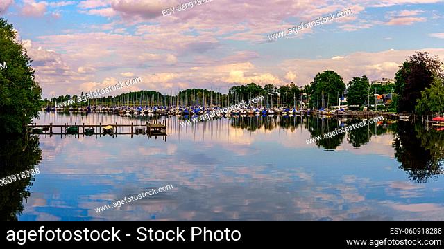 Steinhude, Lower Saxony, Germany - June 08, 2020: View at the Steinhuder Meer with a jetty and the marina near the bathing island