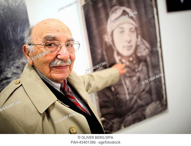 Contemporary witness Ernest Kolman points to a photo depicting him in his youth in Cologne, Germany, 16 October 2013. The exhibition about the rescue transports...