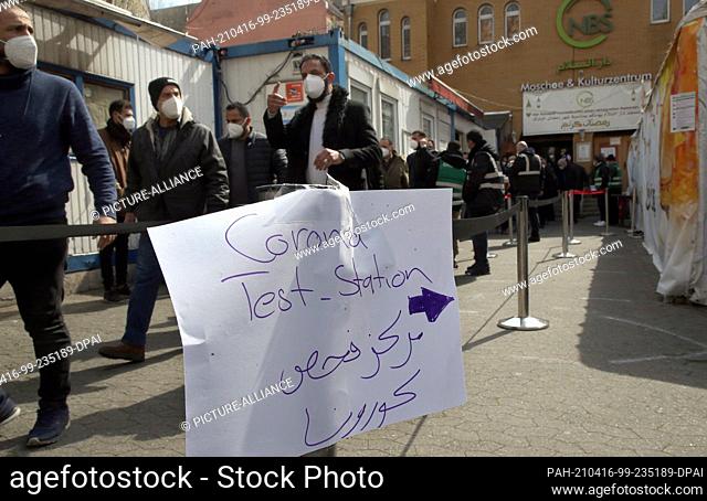 16 April 2021, Berlin: Believing Muslims get tested for Corona in front of the Dar-as-Salam mosque in the Neukölln district before entering the prayer room