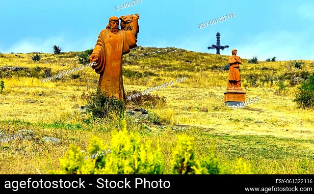 MOUNT ARAGATS, ARMENIA - SEPTEMBER 25, 2017:Statues creator Armenian Alphabet - Mesrop Mashtots and his disciple on Mount Aragats