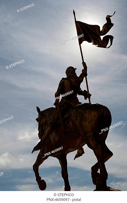 Jeanne d'arc statue mounting horse and holding a flag, 1er arrondissement, Paris, France