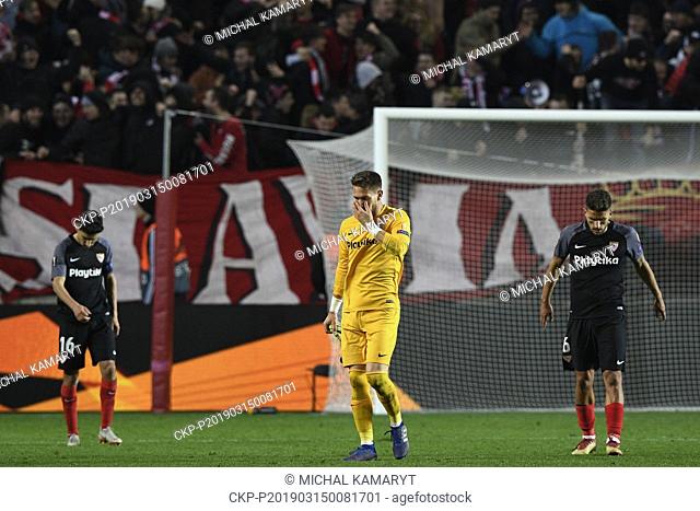 L-R Sevilla players Jesus Navas, goalkeeper Tomas Vaclik and Daniel Filipe Martins Carrico react after Sevilla lost the UEFA Europa League, round of 16, 2nd leg