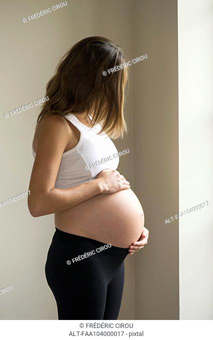 Pregnant woman contemplating future