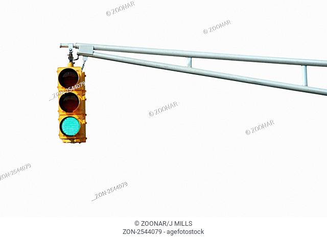 Isolated Green traffic signal light on white